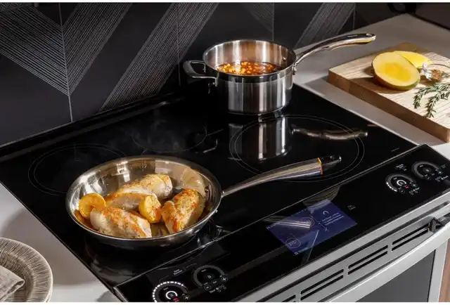 GE Profile induction stove top with cookware